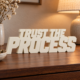 Trust the Process desk letters in a home setting