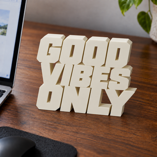 Good Vibes Only desk letters on an office desk