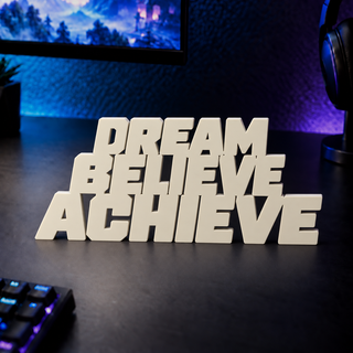 Dream Believe Achieve desk letters on a gaming desk