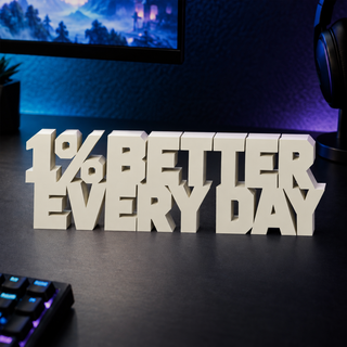 1% Better Every Day desk letters on a gaming desk
