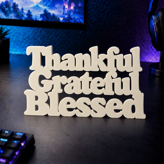 Thankful Grateful Blessed desk letters on a gaming desk