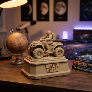 Dare to Dream (Astronaut) desk trophy on an executive desk