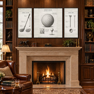 Vintage Golf Studies golf canvases above a stone fireplace in a library with leather armchairs