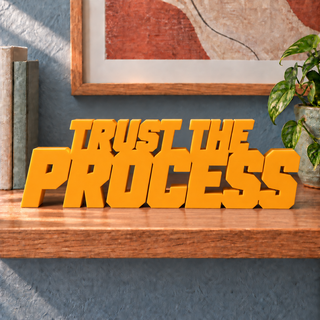 Trust the Process desk letters in Orange
