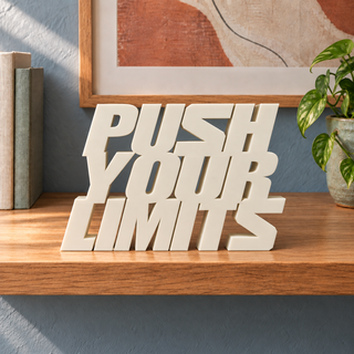 Push Your Limits desk letters in Ivory on the ledge