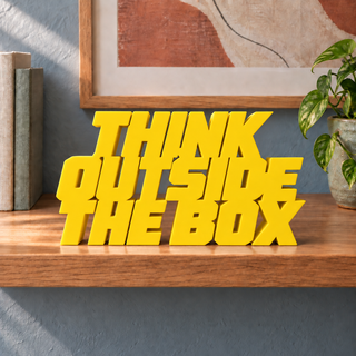Think Outside the Box desk letters in Yellow