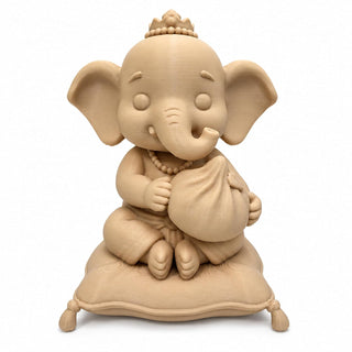 Mini Ganesha idol showing sculpted crown, mala and modak