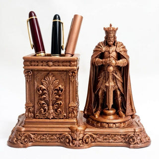Royal King pen stand showing crown, cape and acanthus scrollwork