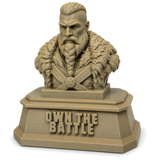 The Warrior desk sculpture on white background showing sculpted fur mantle and crossed axes