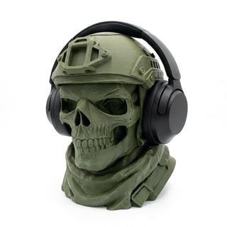 Tactical skull headphone stand in matte army green, front three-quarter view on white