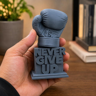 Never Give Up trophy on a desk