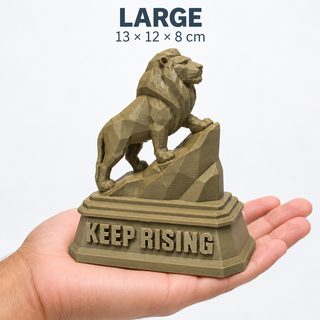 Large The Lion sculpture held above a palm