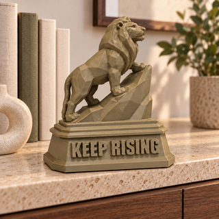 XL The Lion sculpture beside books and a planter