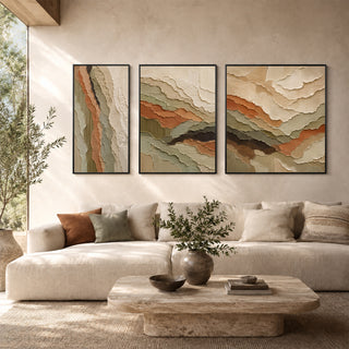 Framed 3D relief wall art in a sunlit living room
