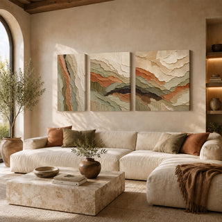 Terracotta and sage 3D relief textured canvas set of 3 above a cream sofa