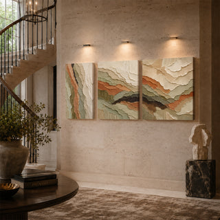 Relief textured canvas set of 3 on a stairwell wall