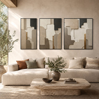 Framed 3D relief stone wall art in a sunlit living room