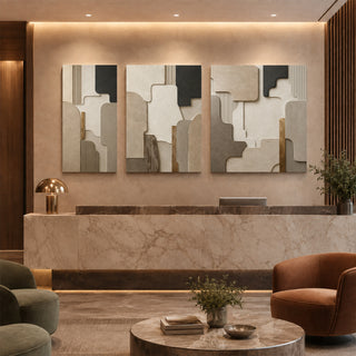 Stone relief textured canvas set of 3 in a marble reception lobby