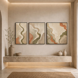 Black box framed flowing relief canvas set above a stone ledge
