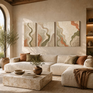 Olive and rust flowing 3D relief textured canvas print set of 3 above a cream sofa