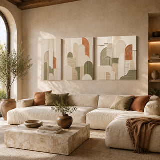 Arched abstract 3D relief textured canvas print set of 3 above a cream sofa