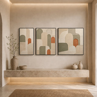 Black box framed abstract relief canvas set above a stone ledge