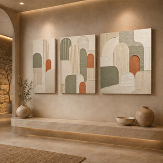 Gallery wrap olive and terracotta abstract relief canvas above a stone ledge