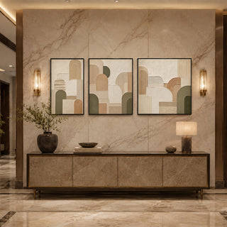 Black box framed geometric abstract relief triptych above a marble console