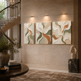 Organic abstract relief canvas triptych on a stairwell wall