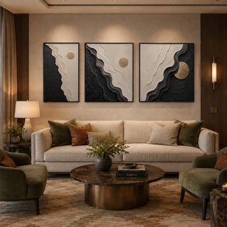 Black box framed black and white abstract relief canvas set of 3 in a lounge