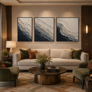 Black box framed grey abstract relief canvas set of 3 in a panelled lounge