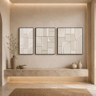 Black box framed abstract relief canvas set above a stone ledge