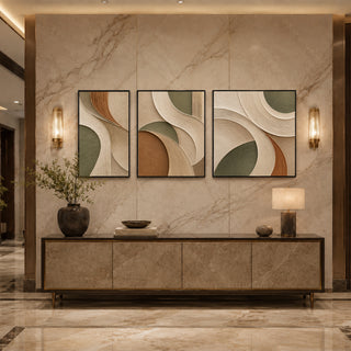 Black box framed sage arc abstract relief triptych above a marble console
