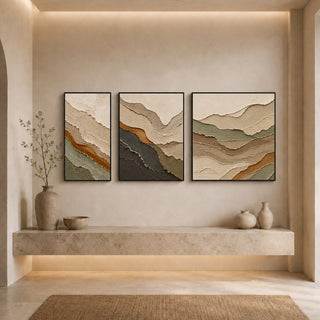 Black box framed abstract relief canvas set above a stone ledge