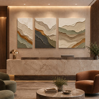 Earth tone layered ridge abstract relief canvas set of 3 in a marble reception lobby