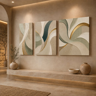 Gallery wrap gold spiral abstract relief canvas above a stone ledge